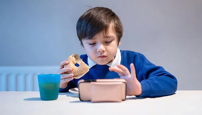 Do you allow your child screen time while eating? Why it is a bad idea and what you can do instead