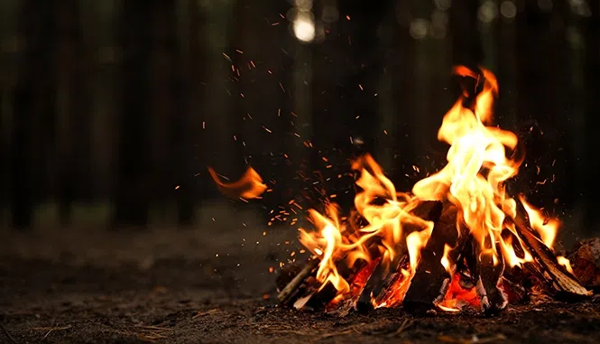 gathering around a bonfire and watching doordarshan